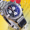 Silver wristwatch with a digital display on a yellow background, branded 'Neofashion'.